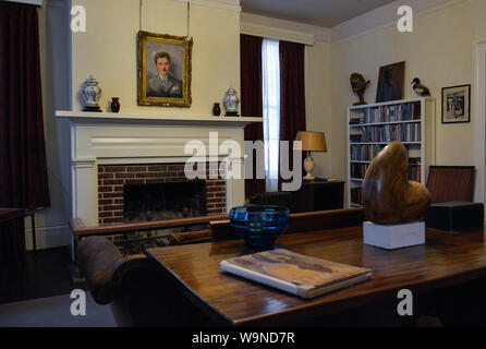 The Library with a portrait of the homeowner, Pulitzer Prize winning author, William Faulkner, inside his residence, Rowan Oak, Oxford, MS Stock Photo