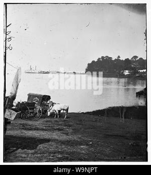 Belle Plain Landing, Virginia. Distance view of Belle Plain Landing on the James River. (U.S. Mail wagon 2nd Corps in foreground) Stock Photo