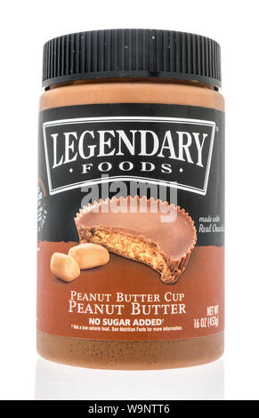 Winneconne, WI - 13 August 2019 : A jar of Legendary foods peanut butter cup peanut butter on an isolated background Stock Photo