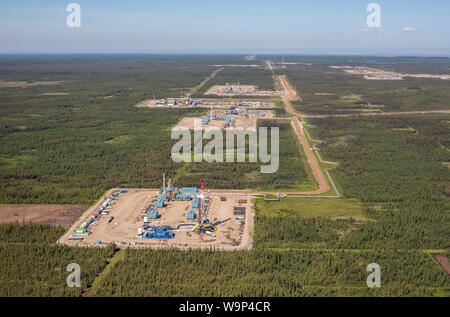 Aerial photo of drilling rig at Suncor Firebag SAGD (Steam Assisted Gravity Drainage) operation in final stages of construction. Stock Photo
