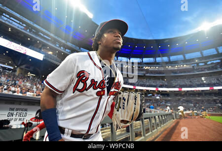 Atlanta, GA, USA. August 14, 2019: Atlanta Braves outfielder Ronald Acuna Jr. runs out onto the field before the start of a MLB game against the New York Mets at SunTrust Park in Atlanta, GA. Austin McAfee/CSM Credit: Cal Sport Media/Alamy Live News Stock Photo