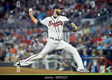 Atlanta, GA, USA. August 14, 2019: Atlanta Braves pitcher Chris Martin delivers a pitch during the seventh inning of a MLB game against the New York Mets at SunTrust Park in Atlanta, GA. Austin McAfee/CSM Credit: Cal Sport Media/Alamy Live News Stock Photo