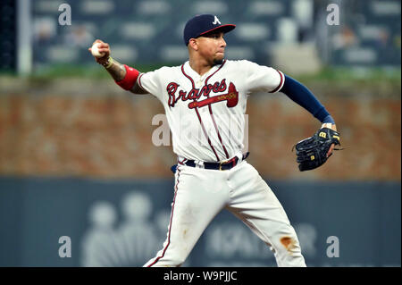 Atlanta, GA, USA. August 14, 2019: Atlanta Braves infielder Johan Camargo makes a throw to first base during the ninth inning of a MLB game against the New York Mets at SunTrust Park in Atlanta, GA. Austin McAfee/CSM Credit: Cal Sport Media/Alamy Live News Stock Photo