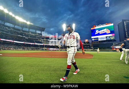 Atlanta, GA, USA. August 14, 2019: Atlanta Braves outfielder Ronald Acuna Jr. walks towards the dugout before the start of a MLB game against the New York Mets at SunTrust Park in Atlanta, GA. Austin McAfee/CSM Credit: Cal Sport Media/Alamy Live News Stock Photo