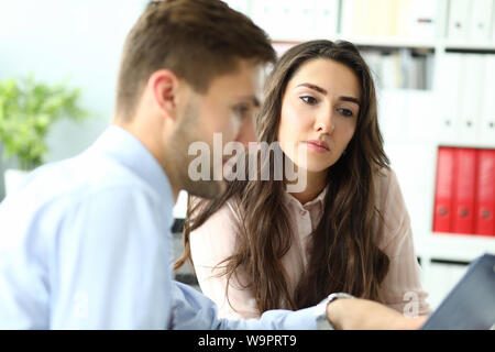 Beautiful female discussing contract Stock Photo