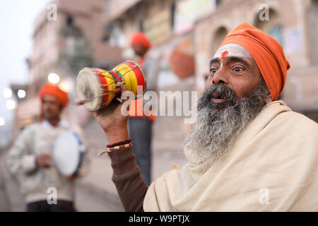 Sadhu (holy man) on the ghats of Ganges in Varanasi, India. Varanasi is the holiest of the seven sacred cities in India. Stock Photo