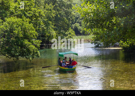 LJUBANISTA, MACEDONIA - MAY 29, 2018: Boat on the very clear river Black Drin at the monastery St Naum Stock Photo