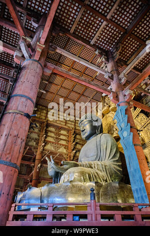 The interior of the ancient daibutsuden at Todaiji, Nara houses the worlds largest statue of Buddha cast in bronze. Stock Photo