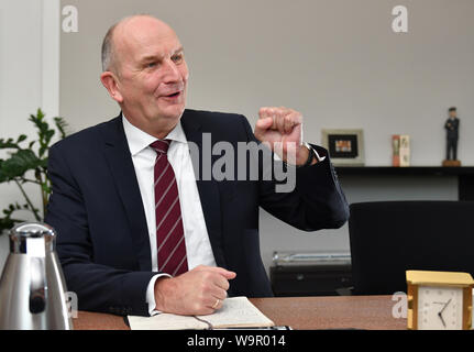 Potsdam, Germany. 11th Mar, 2019. Brandenburg's Prime Minister Dietmar Woidke (SPD) during an interview at his desk in his study at the Potsdam State Chancellery. Credit: Thomas Uhlemann/dpa-zentralbild/ZB/dpa/Alamy Live News Stock Photo