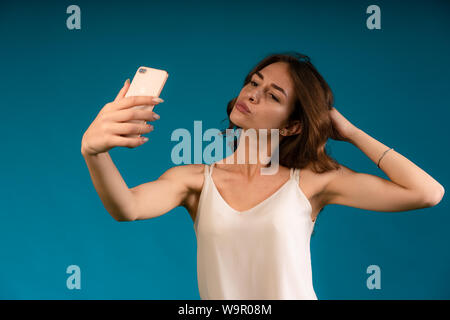 Close-up portrait of her she nice-looking charming attractive lovely winsome fascinating cheerful cheery straight-haired lady making taking selfie iso Stock Photo