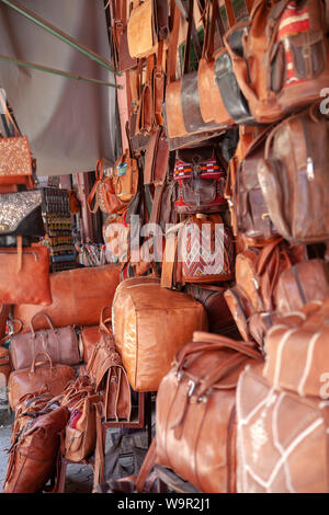 Leather Goods fo Sale in Lanes of Medina Bazaar - Marrakesh, Morocco Stock Photo