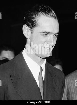 Vintage photo of American business tycoon, pilot, engineer, film producer and philanthropist Howard Hughes (1905 – 1976). The picture was taken in Washington DC on July 21 1938, a few days after Hughes set an aviation record by completing a round the world flight in just over 91 hours. Stock Photo