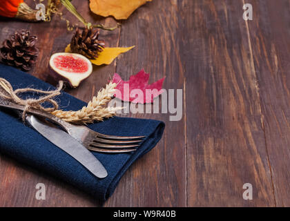 Thanksgiving day table setting on the wooden table close-up Stock Photo