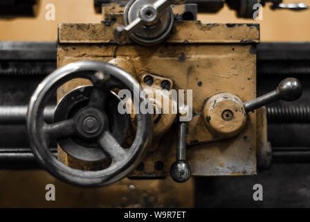 background - detail of an old manual metalworking turning lathe Stock Photo