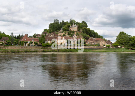 Village of Limeuil, France. Picturesque view of the village of Limeuil with the Dordogne River in the foreground. Stock Photo
