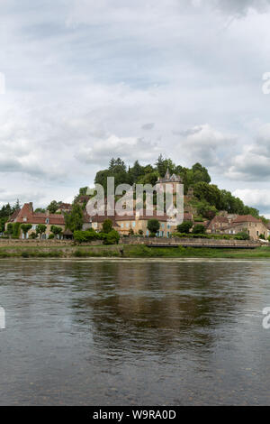Village of Limeuil, France. Picturesque view of the village of Limeuil with the Dordogne River in the foreground. Stock Photo