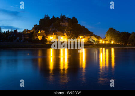 Village of Limeuil, France. Picturesque night view of the village of Limeuil with the Dordogne River in the foreground. Stock Photo