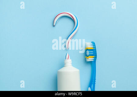 Question Mark With Toothpaste question mark from white toothpaste on blue background Stock Photo - Alamy