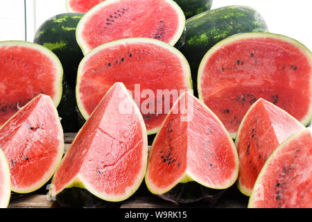 Ripe juicy watermelons on a market. Stock Photo