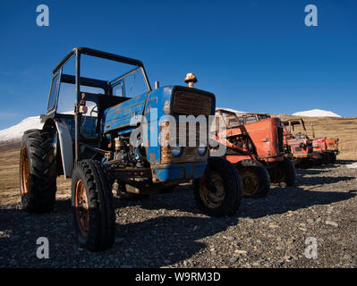 Several vintage tractors of different brands. Photo from April in Iceland Stock Photo