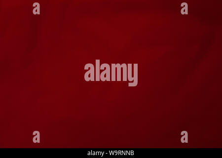 Burgundy red background, textile, material, factory cloth velvet, abstract pattern Stock Photo