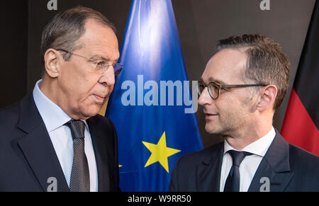 FILED - 15 February 2019, Bavaria, Munich: Heiko Maas (SPD, r), Federal Foreign Minister, and Sergei Lavrov, Foreign Minister of Russia, are about to meet for a photo conversation. Federal Foreign Minister Heiko Maas (SPD) and his Russian counterpart Sergei Lavrov will meet in Moscow on 21 August for talks on the conflict in Ukraine, among other things. The meeting will also focus on the situation in Syria and Iran's nuclear programme, as announced by the Foreign Ministry in Moscow on Thursday. (to dpa 'Maas and Lavrov speak in Moscow about Ukraine and other conflicts' Photo: Sven Hoppe/dpa Stock Photo