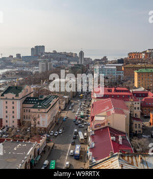 VLADIVOSTOK, RUSSIA - FEBRUARY 25, 2015: Svetlanskaya street view. Svetlanskaya Street is a major street in Vladivostok, Russia. Stock Photo
