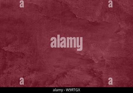 Dark red Concrete textured background to your concept or product. Winter 2020 color trend. Stock Photo