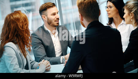 Group of architects working together on project Stock Photo