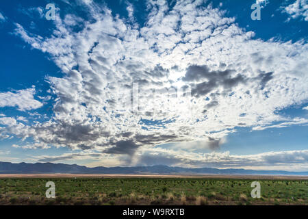 Clouds formation over a dried lake in Nevada, USA. Stock Photo