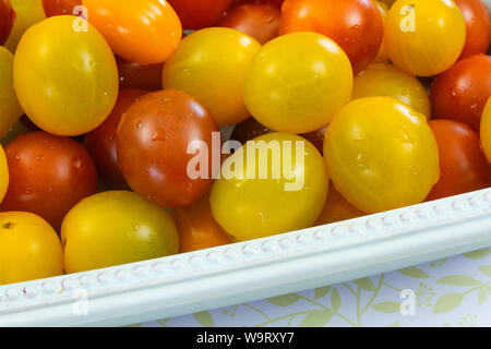 several yellow and red cherry tomatoes Stock Photo