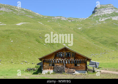 Rural chalet at Engstlenalp over Engelberg on the Swiss alps Stock Photo