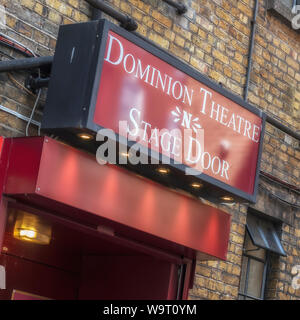 LONDON, UK - JULY 26, 2018:  Stage Door sign for Dominion Theatre on Tottenham Court Road Stock Photo