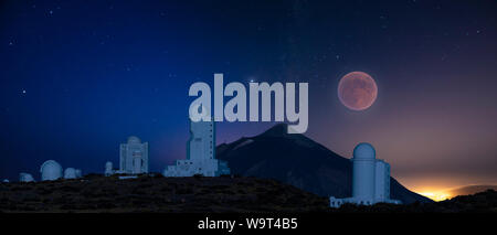 astronomical observatory in the night sky during a full moon Stock Photo