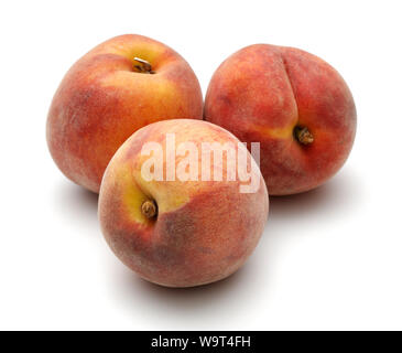 Three whole peaches isolated on white background Stock Photo