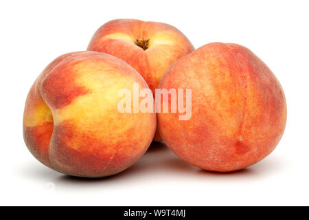Three whole peaches isolated on white background Stock Photo