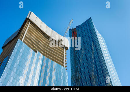 Two of the four Deansgate Square apartment blocks under construction (Aug 2019).  Manchester, England, UK. Stock Photo