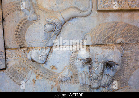 Bas-relief of lion and bull in the apadana palace staircase. Stock Photo