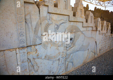 Bas-relief of lion and bull in the apadana palace staircase. Stock Photo