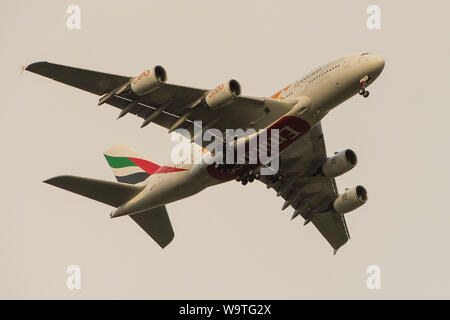 Glasgow, UK. 27 April 2019.  Stock image Emirates A380 Super Jumbo Jet lines up on approach for landing. Stock Photo