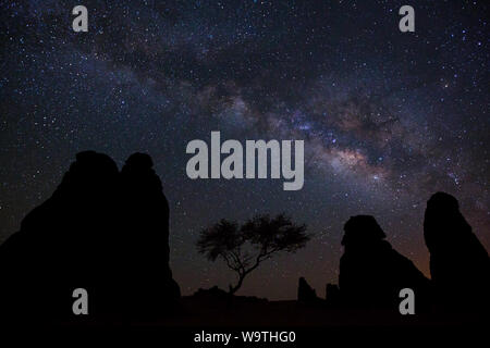 Silhouette of rock formations against the milky way at night, Riyadh, Saudi Arabia Stock Photo