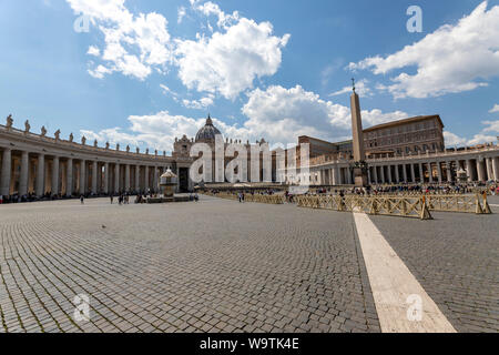 View of St. Peter's Square, in Rome, with the colonnade and the Basilica of Saint Peter Stock Photo
