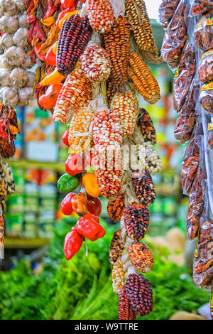 Several traditional varieties of corn on a marketplace in Lima Stock Photo