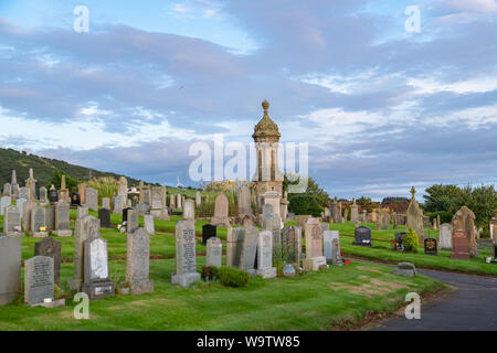 West Kilbride, Scotland, UK - August 10, 2019: Over looking the Gothic spier at West Kilbride cemetery on the west coast of Scotland. Stock Photo