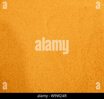 Groats raw couscous yellow. Solid background Stock Photo