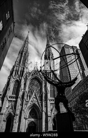 St. Patricks Cathedral and the statue of Atlas located on the fifth avenue of NYC Stock Photo