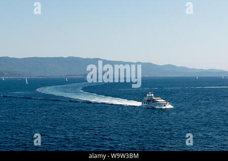 Ajaccio, corsica, 2019-08-04, Super yacht at sea with visable long wash behind Stock Photo