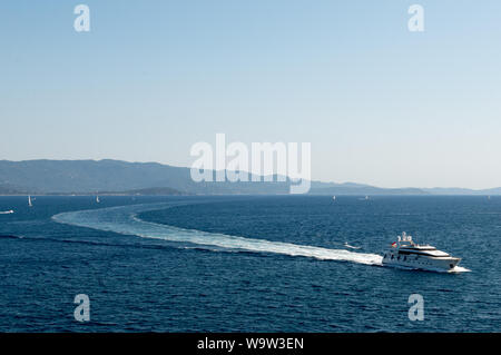 Ajaccio, corsica, 2019-08-04, Super yacht at sea with visable long wash behind Stock Photo