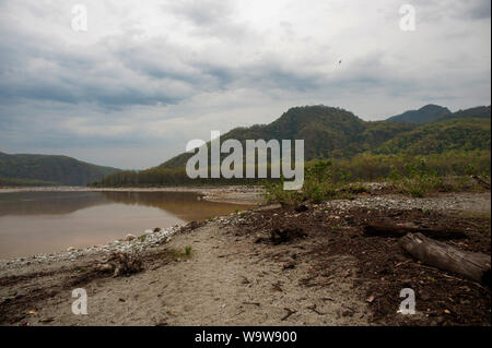 Confluence of Sarda and Ladhya rivers near Chuka and Thak villages, location made famous by Jim Corbett in his book Maneaters of Kumaon, Uttarakhand Stock Photo