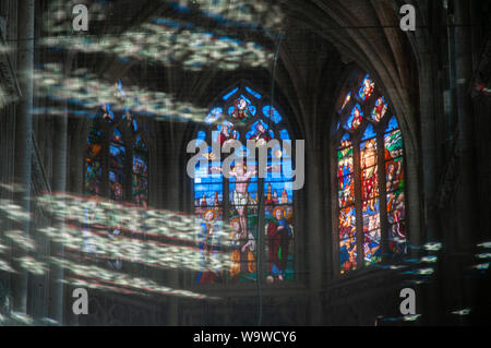 sunlight and shadows playing on the safety net below the ceiling in Saint-Jacques church in Dieppe, France. Stock Photo